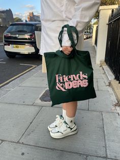 Friends&Ideas Tote Bag - handmade with love in London. It is reusable, can be easily carried, folded and stored. All these qualities qualify it to be replaced with the use of plastic and non-bio-degradable bags. You can wear a crochet tote bag as long as you wish and return on the environmental investment. A tote bag is your best option. You can carry it anywhere you wish to. If you need an all-rounder bag that can transform from a day bag to a travel bag with ease, tote bags are the best option Casual Green Bag With Letter Print, Trendy Green Pouch Canvas Bag, Casual Green Bag As Gift, Casual Green Canvas Gift Bag, Casual Green Reusable Bag, Green Canvas Bag With Letter Print For Everyday, Green Letter Print Shoulder Bag For Daily Use, Green Shoulder Bag With Letter Print For Daily Use, Trendy Everyday Recyclable Bags