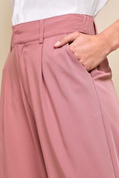 Create a luxe look in an instant with the Lulus Posh Mindset Mauve High-Waisted Wide-Leg Trouser Pants! Sleek woven fabric shapes these style-forward pants that have a high-waisted silhouette (with elastic at the back for best fit), belt loops, a hidden zip-fly, and double-clasp top closures. Relaxed, wide pant legs with side seam pockets end at ankle-length hems. Fit: This garment fits true to size. Length: Ankle length. Size medium Inseam: 28.00 Front Rise: 12.75 Waist: Fitted - elastic waist Feminine Stretch Wide Leg Bottoms, Feminine Ankle-length Workwear Bottoms, Feminine High Waist Bottoms For Work, Feminine Workwear Bottoms, Feminine Long Pants For Workwear, Feminine Fitted Solid Color Bottoms, Feminine Wide Leg Workwear Bottoms, Feminine Wide-leg Workwear Bottoms, Feminine Fitted Wide Leg Bottoms