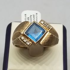 Vintage 10K Yellow Gold with Topaz and Diamonds Ring, Size 12. Stamped 10K inside band. Stone is 7mm square. Ring is 14mm wide. Weighs 5.1 dwt. We do not check prongs for wear or stones for looseness. All items are sold AS IS, noting that we are a resale shop so everything here had a previous owner! We will include flaws in the description when noted. This is one of the reasons our items are more affordable than new at a jewelry store. Are these stones real or fake? Aside from diamonds, we do not know if any gemstones are natural or synthetic. We will state on certain gemstones, that we know 100%, if they are created or fake due to their lack of inclusions. For this reason, we do not sell any diamonds without inclusions, and the larger diamonds (half ct+) are soft graded. In recent years, Rectangular Diamond Topaz Ring For Anniversary, Rectangular Topaz And Diamond Ring For Anniversary, Modern Gold Topaz Ring In Rectangular Shape, Modern Gold Rectangular Topaz Ring, Gold Rectangular Blue Topaz Rings, 14k Yellow Gold Multi-stone Gemstones, Heirloom Yellow Topaz Jewelry, 14k Gold Multi-stone Topaz Ring, Yellow Topaz Ring In 14k Gold, Birthstone