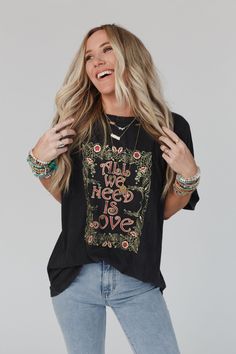 Everyone needs their go-to graphic tee and the Share The Love Graphic Tee is the perfect essential to your boho closet!You'll love wearing this top because it features:Comfortable, mineral washed fabricPerfect oversized and loose fitVintage-style graphic of a flower frame and Hippie Soft-washed Relaxed Fit Tops, Hippie Style Soft-washed Relaxed Fit Top, Distressed Cotton Bohemian Tops, Bohemian Distressed Cotton Tops, Bohemian Relaxed Fit T-shirt With Letter Print, Distressed Bohemian Top For Festival, Bohemian Washed Short Sleeve T-shirt, Bohemian Distressed Top For Festival, Hippie Oversized Graphic Print Tops