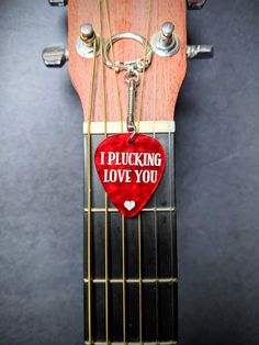 Acrylic laser cut guitar picks keychain. Makes a great gift for an anniversary , a wedding day gift or something to grab someone just because you love them! The pick comes in two different colors, marble red and marble brown. These are not real guitar picks, they are cut from acrylic and are very durable. Lightweight. Measures at 1.5 inches long.  What to customize it to say whatever you like? Reach out to us and let us know? We'd love to do a custom listing for you! Musician Boyfriend, Guitar Pick Keychain, Acrylic Laser Cut, Guitar Gifts, Guitar Picks, Guitar Pick, Laser Cutting, Anniversary Gift, Wedding Gift