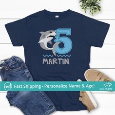 Kids Tshirt BIR-059: YL, Tshirt Color: White Customizable Short Sleeve T-shirt For First Birthday, Birthday T-shirt With Name Print, Short Sleeve, Birthday Name Print Short Sleeve T-shirt, Blue Summer T-shirt For First Birthday, Blue Short Sleeve T-shirt For First Birthday, Casual Blue Birthday Tops, Blue Short Sleeve Tops For Birthday Gift, First Birthday Graphic Tee With Crew Neck, Number Print T-shirt For Summer