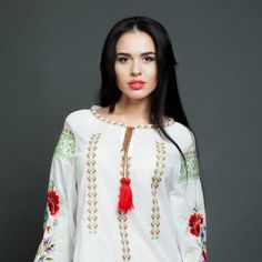 "Embroidered blouse \"Whisper of poppies\" is made accordingly to traditions of ukrainian style. This embroidered boho blouse has a wide sleeve and neck with drawstring. From shoulder line begins hand floral embroidery. The main feature of the peasant blouse ia a combination of various embroidery techniques - cross-stitch and satin stitch embroidery on sleeves. The cross stitch embroidery is made with calm green tones on this mexican blouse. This Embroidered white blouse can be worn with a skirt Folk Style Peasant Tunic Top With Floral Embroidery, Folk Style Peasant Top With Floral Embroidery, Folk Style Tunic Blouse With Intricate Embroidery, Folk-style Tunic Blouse With Intricate Embroidery, Bohemian Tunic Blouse With Floral Embroidery, Folk Style Tunic Blouse With Floral Embroidery, Folk Style Embroidered Tunic Top, Folk Style Floral Embroidery Tunic Blouse, Folk Style Floral Embroidered Tunic Blouse