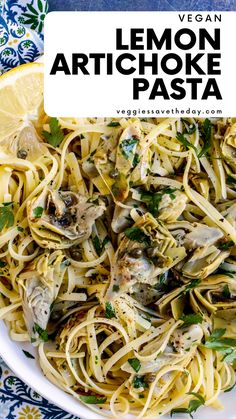 lemon artichoke pasta in a white bowl on a blue and white tablecloth