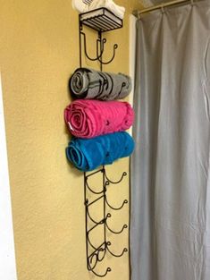 a towel rack with towels hanging on it