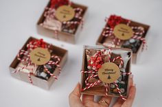 three small boxes filled with different types of gifts