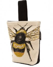 a white and black bag with a bee on it