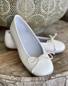 Beautiful and comfortable Spanish shoes for girls to wear on special occasions, such as the first communion. Please refer to the size conversion table. 100% leather Made in Spain Final Sale, no exchanges nor returns will be available Cream Round Toe Ballet Flats For Formal Occasions, Classic Cream Ballet Flats With Round Toe, White Round Toe Ballet Flats For Formal Occasions, White Closed Toe Ballet Flats With Rubber Sole, Elegant Cream Ballet Flats With Round Toe, White Leather Ballet Flats With Round Toe, Cream Leather Slip-on Ballet Flats, Cream Leather Closed Toe Ballet Flats, White Leather Ballet Flats With Rubber Sole