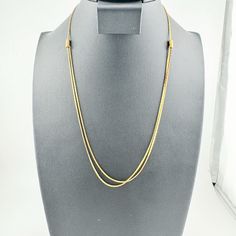 Add a touch of quiet luxury to your summer wardrobe with this enchanting vintage necklace. This minimalist piece features a delicate gold chain, perfect for adding a touch of sophisticated elegance to any outfit. The necklace lays beautifully on the collarbone, making it a versatile piece that can be dressed up or down. Whether you're a fan of vintage style or simply love minimalist jewelry, this necklace is a must-have. Size: 8.75 inch drop, Adjustable Slide *Condition: Some minor finish wear as shown in photos. Previously owned and in great condition, making it a valuable find for any collector. ~ Thank you for supporting my Latina | Female | Air Force Veteran owned small business. Please check out the other vintage jewelry items in my shop to fill your soul. Offers Always Welcome #layer Minimalist Layered Long Necklace With Clavicle Chain, Minimalist Long Layered Clavicle Necklace, Minimalist Gold Plated Double Chain Charm Necklace, Minimalist Double Chain Yellow Gold Necklace, Minimalist Double Strand Necklace For Formal Occasions, Minimalist Yellow Gold Charm Necklace With Double Chain, Minimalist Layered Necklace With Clavicle Chain, Elegant Gold-tone Layered Necklace For Everyday, Minimalist Snake Chain Layered Necklace