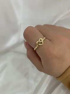 Cute heart and infinity ring in 14k solid gold, yellow gold with shiny finish, it is size 7 but we can make it to the measure you need, send a message if you have another question, item sold by piece, weight undetermined. Heart And Infinity, Gold Heart Ring, Infinity Heart, Infinity Ring, Cute Heart, Ring Gold, Gold Yellow, Rings Statement, Gold Ring