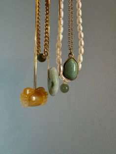 This dainty gemstone necklace with a pop of light green color features a skinny adjustable chain plated with gold and an aventurine pendant. It will be your new everyday necklace no matter the outfit.

Natural aventurine. Made by handwork of carving and polishing. Because of the gemstone’s natural characteristics, each piece may vary slightly in colors and textures. Gold Jade Gemstone Crystal Necklace, Gold Jade Crystal Necklace With Gemstone, Gold Jade Crystal Necklaces As Gifts, Gold Jade Crystal Necklace Gift, Gold Jade Crystal Necklace As Gift, Gold Jade Necklace With Gemstone Beads, Everyday Gold Charm Necklaces With Natural Stones, Gold Aventurine Necklace As Gift, Gold Aventurine Necklace For Gift