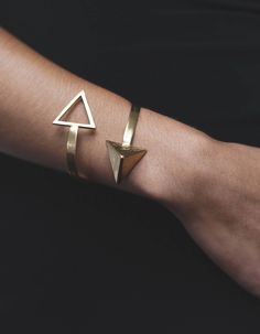 The original signature cuff! A firm favourite and unmistakable Hannah Humpston Jewellery design. Inspired by the bold geometric motifs found in ancient Andean weavings, this is a versatile piece.Hand made in sterling silver with a signature surface texture, this cuff is one size and is adjustable, making this piece perfect for gifting.Also available in 18ct gold vermeil.Materials: Sterling silverWeight: 27gDimensions: Triangle motifs – 3cm x 3cmSize: One sizeEach piece of HHJ comes beautifully p Modern Sterling Silver Cuff Jewelry, Gold Sterling Silver Cuff Bracelet, Gold Sterling Silver Cuff Jewelry, Modern Handmade Cuff Jewelry, Modern Adjustable Sterling Silver Cuff Bracelet, Modern Geometric Jewelry With Unique Design, Minimalist Sterling Silver Open Cuff Jewelry, Minimalist Cuff Jewelry For Gifts, Minimalist Cuff Jewelry Gift