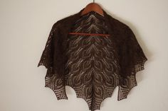 This hand knit shawl is made of 50% merino/50% tencel in a coffee brown color.It's perfect with an elegant dress and also with jeans or shirt and there is a lot of ways to wear it.It is very light and tender.It was made for women who like to be unique.Please note: THIS ITEM IS MADE TO ORDER! I'll be happy to make this shawl for you in the color and size you want to wear. It will take about 7-15 days to make the same model. All variations in color are shown at the last photo. Please contact me an Elegant Handmade Shawl As Gift, Elegant Handmade Shawl Wrap, Elegant Handmade Shawl For Gift, Coffee Brown Color, Women Knitting, Brown Autumn, Shawl Wedding, Bridesmaid Shawl, Hand Knit Shawl