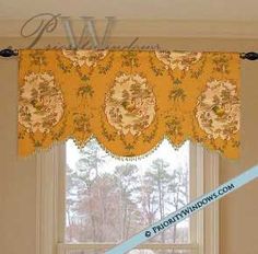 a window with a yellow curtain hanging from it's side