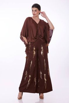 Chocolate brown draped kaftan in blended satin base with V neckline. - Aza Fashions Silk Draped Sets For Evening, Silk Draped Evening Set, Evening Kaftan With Draped Cape Sleeves, Elegant Draped Silk Sets, Silk Palazzo Set For Eid Evening, Formal Draped Silk Sets, Elegant Draped Sets For Eid, Silk Maxi Length Palazzo Set For Eid, Festive Silk Palazzo Set For Evening