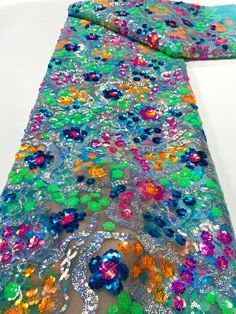 This high quality Fabric is measured in 5 Yards With Embroidered Beading and Sequin. It is soft, very delicate and beautiful. This high Quality Fabric is made with Fashion embroidered rhinestones can be used in making party wedding dresses, skirts, shawls, scarves and other other fashion apparels as you would like. Size : Length : 5 yards (180 inch). Width: 50 inch (Please allow slight deviation for the measurement data ,±1 inch) Material: 100% Polyester, Tulle Lace Fabric, Eco-Friendly embroide Party Multicolor Embroidered Fabric With Sequins, Party Embroidered Fabric With Multicolor Sequins, Multicolor Embellished Embroidered Fabric For Reception, Multicolor Embroidered Fabric With Sequins For Wedding, Fitted Multicolor Embroidered Fabric For Party, Multicolor Sequined Embroidery Fabric For Wedding, Multicolor 3d Embroidered Fabric For Party, Elegant Multicolor Sequin Fabric For Wedding, Multicolor Sequined Embroidered Fabric For Wedding