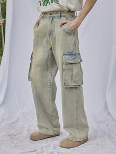 This is a comfortable and trendy pants by MAGOODGAN that is made out of high quality cotton 100% fabric. With unique design detail and trendy mood, it will stand out from your casual daily outfit. - Big voluminous cargo pockets on the side- Sturdy high quality stitches overall- Unisex item with wide silhouette Cotton Straight Cargo Jeans With Hip Pockets, Casual Washed Blue Cargo Jeans With Hip Pockets, Straight Cotton Cargo Jeans With Hip Pockets, Casual Washed Blue Cargo Jeans, Casual Washed Blue Jeans With Side Pockets, Casual Washed Blue Cargo Pants With Patch Pockets, Cotton Jeans With Cargo Pockets In Washed Blue, Cotton Jeans With Tapered Leg And Pockets, Cotton Jeans With Pockets And Tapered Leg