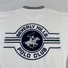 Vintage Beverly Hills Polo Club Offence Pullover Sweatshirt Mens Large White Y2k Please Note There Are A Few Spots On This Sweatshirt That Should Come Out With The First Wash. The Item Shown In The Pictures Is The Exact Item You Will Receive. Please See All Pictures For Measurements! Condition Notes: Whether This Item Is New Or Pre-Owned We Encourage You To View All Of The Pictures Provided For Measurements And Or Any Noticeable Flaws. We Suggest You Compare The Measurements To Your Favorite Clo Retro White Top With Ribbed Collar, White Retro Top With Ribbed Collar, Sporty Crew Neck Polo Shirt With Letter Print, Long Sleeve Cotton Polo Shirt With Embroidered Logo, Casual Long Sleeve Polo Shirt With Graphic Print, Casual Long-sleeved Polo Shirt With Graphic Print, Streetwear Polo Collar Top With Embroidered Logo, White Polo Shirt With Ribbed Collar, White Crew Neck Polo Shirt With Ribbed Collar