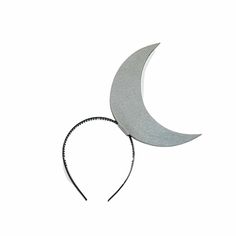 the moon headband is made from metal and has a black band around it's neck