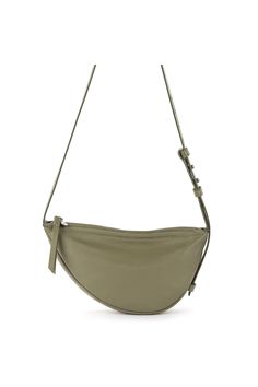 The Tess Sling combines the accessibility of a belt bag with the body-skimming comfort of a crossbody. Kitted with interior pockets and a long adjustable strap, this must-have bag is perfect for anyone who prioritizes straightforward, functional design. 6in L x 2.625in W x 11.5in H; Drop: 20 inches; Weight: 0.62 lb Interior: Repreve Lining Main zipper closure Adjustable Strap Interior contains a back zipper pocket and a slip pocket Adjustable leather sling strap Premium leather from a Leather Wo Modern Crossbody Saddle Bag With Adjustable Strap, Daily Use Crossbody Belt Bag With Adjustable Strap, Versatile Green Belt Bag With Adjustable Strap, Versatile Shoulder Belt Bag With Adjustable Strap, Versatile Belt Bag With Adjustable Strap, Modern Satchel Chest Bag With Adjustable Strap, Modern Crossbody Chest Bag With Adjustable Strap, Modern Chest Bag Satchel With Adjustable Strap, Modern Crossbody Belt Bag With Removable Pouch