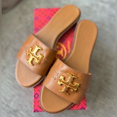 Amazing Tory Burch Every Slide Shoes!! New With Box! Size 7 Sold Out In A Stores Calf Luxurious Leather Very Comfortable And Stylish Looking Piece! Designer Tan Sandals With Cushioned Footbed, Luxury Tan Closed Toe Sandals, Luxury Tan Closed-toe Sandals, Designer Closed Toe Tan Sandals, Designer Tan Closed Toe Sandals, Designer Tan Flat Heel Sandals, Designer Tan Sandals With Leather Lining, Luxury Tan Flat Heel Sandals, Designer Tan Sandals With Round Toe