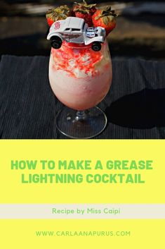 a drink in a glass with strawberries on top and the words how to make a grease lightning cocktail