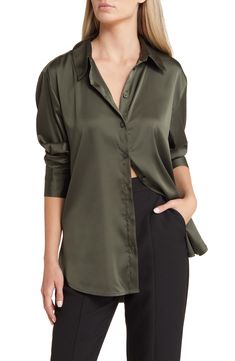 This polished button-up is crafted from rich satin with a drapey, relaxed fit that'll keep your look on point. 21" to 28" front length; 30" back length (size Medium) Point collar Long sleeves with two-button cuffs 97% polyester, 3% spandex Machine wash, tumble dry Imported Green Satin Blouse, Satin Button Up, Olive Shirt, Green City, Night Out Outfit, Satin Shirt, Satin Blouse, Green Satin, Cut Shirts