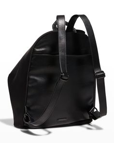 Rebecca Minkoff backpack in nylon and faux leather    Flat top handle     Adjustable shoulder straps     Center zip top closure with lobster clasp     Exterior, back slip pocket     Interior, one zip pocket     Approx. 12"H x 17"W x 6.5"D    Item Weight (lbs.): 1.5    Imported Modern Backpack With Zipper Closure And Double Handle, Leather Backpack With Zipper Closure And Double Handle, Nylon Leather Backpack With Zipper For Daily Use, Modern Nylon Leather Backpack With Zipper Closure, Modern Nylon Leather Backpack With Zipper, Modern Softback Backpack With Zipper Closure, Rebecca Minkoff Backpack, Baddie Makeup, Flats Top