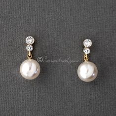 Pearl Drop Crystal Earrings - Cassandra Lynne Hanging Pearl Earrings, Pearl Hanging Earrings Gold, Classic Pearl Drop Earrings For Wedding, Classic White Pearl Bridal Earrings, Classic Pearl Earrings For Wedding, Classic Round Pearl Drop Bridal Earrings, Classic Pearl Chain Bridal Earrings For Anniversary, Classic Bridal Earrings With Pearl Chain For Anniversary, Classic Pearl Embellished Drop Earrings