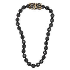 Product Description: This beaded necklace may seem simple with a single strand of jet black beads but it's the gold and black enamel clasp that will turn heads. Dimensions: 20" Black Pendant Necklace, Beaded Pendant Necklace, Black Pendant, Kenneth Jay Lane, Black Enamel, Beaded Pendant, Black Beads, Jet Black, Bead Necklace