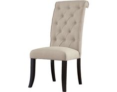 an upholstered dining chair with buttons on the back and legs, in beige fabric