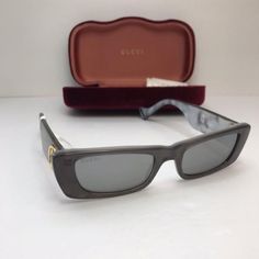 Gucci Gg0516s 002 52 Ladies Sunglasses Gucci Sunglasses. Color Code: 002. Size: 52. Shape: Rectangular. Lens Width: 52 Mm. Lens Bridge: 20 Mm. Arm Length: 145 Mm. 100% Uv Protection. Non - Polarized. Frame Material: Acetate. Frame Color: Grey. Lenses Type: Silver. Lenses Type: Silver. Rim Style: Full - Rim. Gucci Silver Rectangular Ladies Sunglasses Gg0516s 002 52. Specifics Lens Serial Number: Gg0516s Lens Color Code: 002 Lens Size: 52 Lens Width: 52 Mm Lens Bridge: 20 Mm Frame Material: Acetat Designer Gucci Clear Sunglasses, Gucci Designer Clear Sunglasses, Designer Clear Sunglasses With Polarized Lenses, Luxury Clear Gucci Sunglasses, Classic Gucci Glass Sunglasses, Designer Cat Eye Sunglasses With Glass Material, Designer Cat Eye Sunglasses With Glass, Designer Cat Eye Sunglasses With Glass Lenses, Designer Rectangular Glass Sunglasses