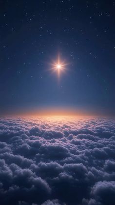 the sun is shining above the clouds in the night sky, with stars on it