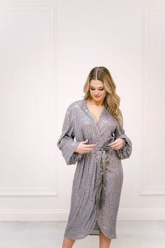 Silver Sequin Wrap Midi Dress V-neck Robe With Tie Waist For Loungewear, Date Night Long Sleeve Wrap Dress With Tie Waist, Chic Long Sleeve Loungewear Robe, Long Sleeve Tie Waist Dress For Night Out, Elegant Evening Robe With V-neck, Elegant V-neck Evening Robe, Elegant V-neck Belted Robe, Elegant Spring Party Robe, Fitted Long Sleeve Evening Robe