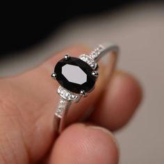 Hey, I found this really awesome Etsy listing at https://www.etsy.com/listing/519640832/genuine-black-spinel-engagement-promise Spinel Ring Engagement, Black Gemstone Ring, Black Spinel Ring, Fantasy Outfits, Swiss Blue Topaz Ring, Gemstone Ring Silver, Rings Ideas, Blue Gemstone Rings, Smoky Quartz Ring