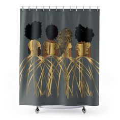 a shower curtain with three african women in gold and black on the front, against a gray background