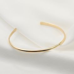 "14K gold cuff bracelet. 14K Gold Minimalist Cuff Bracelet, Delicate cuff bracelet. The bracelet will be shipped in a gift box * 14K solid gold. It is about 2.5mm width. Please select the size of your wrist. If your wrist is 6\", please purchase a 6\" bracelet. (If you order a 6\" bracelet, actual cuff length will be 5\" plus 1 inch opening.) Please read our policies before you place your order. https://www.etsy.com/shop/SashJewelry/policy?ref=shopinfo_policies_leftnav To see other Mother daught Mother Daughter Bracelet Set, Gold Infinity Bracelet, Buddhist Rosary, Infinity Charm Bracelet, Gold Bar Bracelet, Mother Daughter Bracelets, Gold Cuff Bracelet, Solid Gold Bracelet, Mothers Bracelet