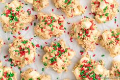 cookies with sprinkles and white frosting on top