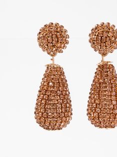 Expertly crafted, the Mila Drop Rhinestone Earrings add a touch of elegance to any outfit. With a delicate drop design and sparkling rhinestones, these earrings are perfect for any occasion. Their timeless beauty and subtle shine make them the perfect accessory for any fashion-forward individual. SizeH: 2.15"W: 0.75" QualityMade with quality materials for endurance. ImportedEY12699 Halo Design, Drop Design, Drops Design, Champagne Gold, Rhinestone Earrings, First They Came, Timeless Beauty, Gold Earrings, Halo