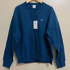 Nike Solo Swoosh Nrg Fleece Crewneck Sweatshirt Valerian Blue Mens L Cv0554-460 Shirts Nike, Valerian, Nike Shirts, Men's Nike, Nike Men, Crewneck Sweatshirt, Sweater Outfits, Crew Neck Sweatshirt, Mens Accessories