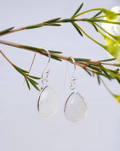 Moonstone Earrings ~ Sterling Silver 925 ~ June Birthstone ~ Gemstone ~ Dangle ~ Handmade ~ Jewelry ~ Tear Drop ~ Maresia ~ Boho 》D E T A I L S《 ✦ M E T A L : Sterling Silver 925 ✦ S T O N E : Moonstone ✦ B I R T H S T O N E : June ( Moonstone ) 💎 Because of the name, this stone always had a strong connection with the magic of the moon. The moonstone is known as a protection for travelers, a gift of love & passion and a path to wisdom. ✧ Please note natural gemstones are unique and may vary Sterling Silver Teardrop Crystal Earrings With Natural Stones, Silver Sterling Crystal Earrings With Natural Stones, Teardrop Sterling Silver Crystal Earrings With Natural Stones, Silver Crystal Earrings With Natural Stones, Silver Drop Earrings With Natural Stones, White Sterling Silver Teardrop Earrings For Gift, Sterling Silver Natural Stones Teardrop Earrings, Silver Dangle Teardrop Earrings With Natural Stones, White Teardrop Gemstone Crystal Earrings