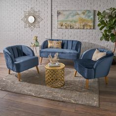 a living room filled with furniture on top of a wooden floor