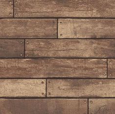 an old wooden wall with rivets and nails