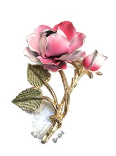 Vintage Big pink rose flower Brooch pin ITEM DESCRIPTION: Offering this lovely metal enamel pink rose brooch. circa estimated 1960s-70s This showy big brooch is sculpted 3d/layered metal. MEASUREMENTS: This detailed designed brooch measures approximately 3 1/8 inches tall and approximately 2 1/4 inches at its widest. CONDITION: This pink rose is in good vintage condition; it has enamel paint wear on the flower front and back. POLICIES: Please keep in mind, I am not an expert in jewelry or vintag Gifts Pink, Rose Brooch, Pink Rose Flower, Wardrobe Accessories, Enamel Brooch, Enamel Paint, Big Flowers, Flower Pins, Vintage Wear