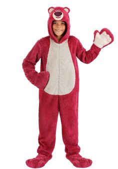 a child in a red bear costume standing with his arms out and smiling at the camera