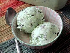 two scoops of ice cream are in a bowl