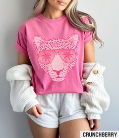 Our retro style graphic tee features a hot pink leopard with sunglasses design. This trendy and aesthetic graphic crewneck gives off perfect Summer vibes. ✩ ✩ 𝗞𝗶𝗱𝘀 𝗖𝗼𝗺𝗳𝗼𝗿𝘁 𝗖𝗼𝗹𝗼𝗿𝘀 𝗧𝗲𝗲: https://starrieapparel.etsy.com/listing/1739105300 ✩ 𝗔𝗱𝘂𝗹𝘁 𝗖𝗼𝗺𝗳𝗼𝗿𝘁 𝗖𝗼𝗹𝗼𝗿𝘀 𝗧𝗲𝗲: https://starrieapparel.etsy.com/listing/1729335814 Hot Pink Leopard Shirt, Trendy Summer Graphic Tee, Cheetah T-shirt, Vacation Tshirt, Comfort Colors Plus Size Animal Print Tee Birthday Gift SIZE Casual Leopard Print Crew Neck T-shirt, Trendy Cotton T-shirt In Leopard Print, Trendy Leopard Print Graphic T-shirt, Leopard Print Top With Letter Print For Summer, Summer Cotton Leopard Print Tops, Trendy Leopard Print Cotton Tops, Cotton Leopard Print T-shirt For Summer, Trendy Leopard Print T-shirt With Crew Neck, Casual Cotton T-shirt In Leopard Print