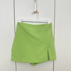 Zara Green Mini Skirt With Shorts, Never Worn, Like New, Xs, High Waisted Zara High Waist Mini Skirt, Green High-waist Stretch Skort, Green High Waist Stretch Skort, Trendy High Waist Green Skort, Green Stretch Mini-length Bottoms, Green Stretch Short Skirt, Trendy Fitted Green Skort, Trendy Green Mini Length Bottoms, Trendy Fitted Zara Skort