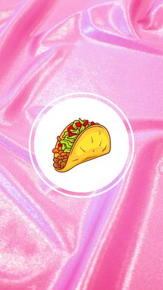 a taco sticker on a pink background