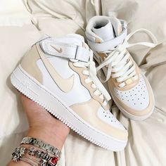 Beige Custom Air Force 1 Low/Mid/High Sneakers. -Our current processing time is 3-4 weeks. We try hard to deliver as fast as we can. The best things are worth the wait. -Size Guide- C (Child) Y (Youth) W (Women) M (Men.) -Exactly as shown in the picture. -Applied Special Acrylic Paint for Shoes and Finisher for more Durability. -Waterproof and flexible. -Made in the US. -100 % Authentic Air Force 1 Sneakers. -Perforated toe cap for breathability. -Chunky foam sole with signature Air cushioning. White And Beige Sneakers, Paint For Shoes, High Sole Sneakers, Nike Air Force High Tops, Emo Shoes, Air Force 1 High Tops, Shoes High Tops, Shoe Painting, Air Force One Shoes